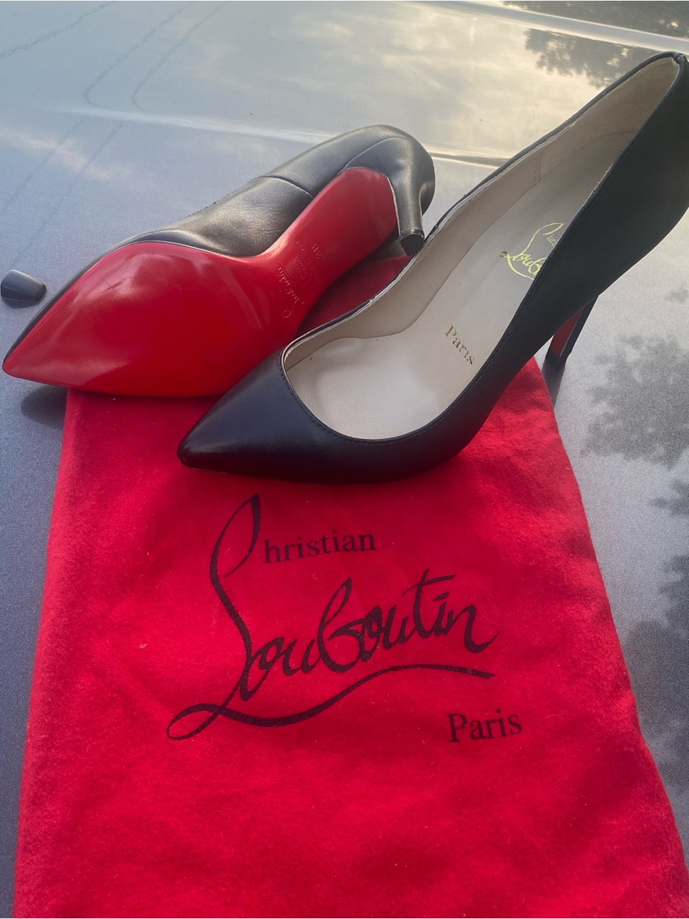Christian Louboutin Black Leather Pointed-Toe Pumps with Red Soles